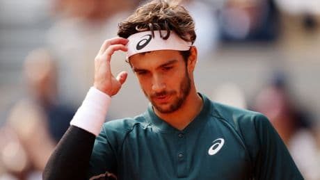 Lorenzo Musetti avoids French Open disqualification after kicking ball at line judge