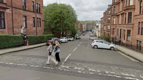 Two people rushed to hospital after 'taking unwell' in Glasgow as police launch probe
