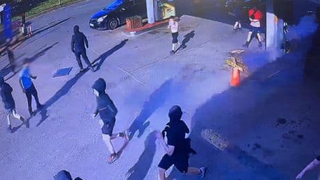 Rampaging masked thugs throw lit flare into Scots petrol station