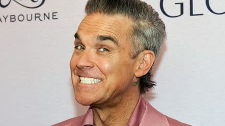 Robbie Williams says his art, which he hopes sells for £40,000 each, takes ‘25 minutes to draw’
