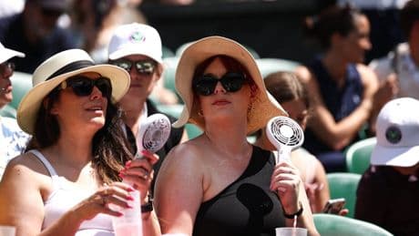 Fans and stewards taken ill as Wimbledon suffers record hot opening day