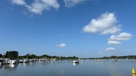 Powerboat driver dies after crashing into houseboat during race in Suffolk