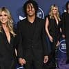 Heidi Klum's nepo baby, 19, towers over her on AMAs red carpet in rare sighting