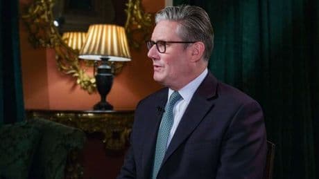 Keir Starmer has his hands up in surrender whenever he walks onto world stage