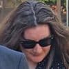 Female teacher, 28, is charged with sexually abusing a child and sending pictures of her naked breasts as she appears in court