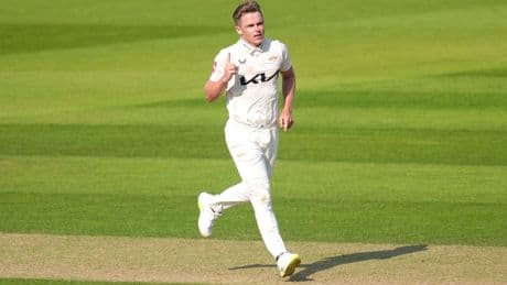 Surrey boost Championship title hopes with five-wicket win over Durham