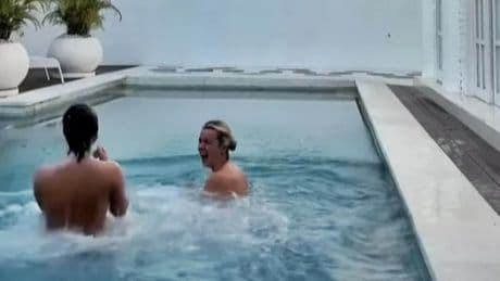 Moment skinny dipping pals dive naked into pool they thought was their private sanctuary – before making shock discovery