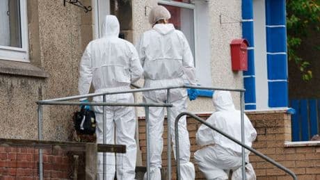 Lanarkshire housing estate lockdown in pictures as man rushed to hospital