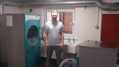 Laundry service at Motherwell tower block now fully functional after one year