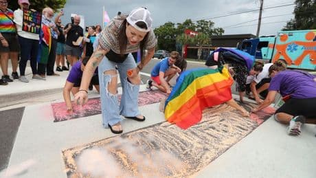 Protesters keep getting arrested and released over rainbow chalk art at the Pulse shooting memorial crosswalk