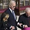 Moment frail Joe Biden forced to grab arm of elderly priest as he struggles to walk unaided at Pope Francis's funeral