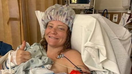 Tourist savaged by shark in shallow water near shore left with 'spaghetti wrist'