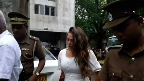 Brit ‘drug mule’ Charlotte May Lee, 21, tears up as cops wheel £1.2m kush haul into court she ‘didn’t know was in case’
