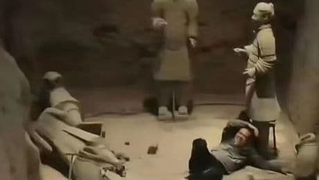 Shock moment tourist jumps into Terracotta Army clay warriors smashing statues