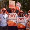 Why are resident doctors striking and what are they paid?