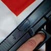 The disturbing social media posts of leading Palestine Action activist: Campaigner poses with GUN and shows off 'terrorist-linked' tattoos amid claims Iran is funding group's activities