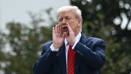 Donald Trump makes bizarre arm gesture after saying he'll put nukes on White House roof