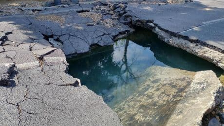 Large sinkhole opens up in middle of road near Clapham Common