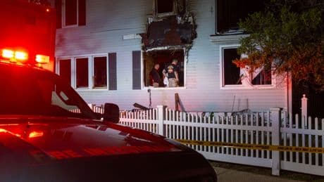 Police Seek Suspect After Firefighters Find Dead Couple, One in Chains