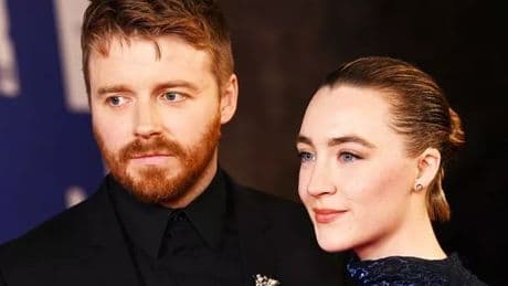 Saoirse Ronan and husband are doting parents as they're spotted with baby for first time