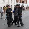 Police arrest 140 revellers on day one of Notting Hill Carnival after colourful start to street party: Figures up 40% on last year amid Met crackdown
