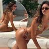 Samie Elishi shows ex Sam Thompson what he's missing as she poses for sultry snaps in a thong bikini during Bali getaway