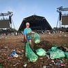 Glastonbury clean-up begins: Hippy crack canisters among mountains of waste strewn around Worthy Farm - as revellers make the long, sweaty (and smelly) journey home