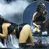 Charli XCX puts on a VERY racy display in tiny black hot pants and mesh top as she performs to HUGE crowd at Glastonbury