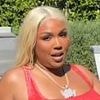 Lizzo channels Baywatch era Pamela Anderson in iconic red swimsuit after sharing 'truth' about her weight loss
