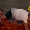 Heart-stopping moment Greek locals rush to the sea and SWIM to rescue boats as they desperately try to escape wildfires