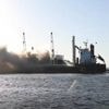 Veel rook bij brand op vrachtschip in Amsterdam, meerdere NL-Alerts verstuurd