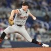 Chapman homers, Harrison pitches five scoreless innings as Giants beat Marlins 2-0