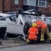 Moment car destroys lamppost and flips car after ploughing off road in high speed crash