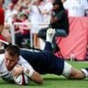 England overcome lightning delay to beat US