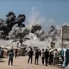 Israel says it is 'opening the gates of Hell' in Gaza as IDF blows up tower block 'used by Hamas terrorists'