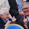 D-Day hero, 99, who ferried Allied troops onto beaches of Normandy as a teenager laughs with Keir Starmer during VE Day procession - ahead of tea with the King at Buckingham Palace