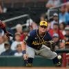 Peralta throws 5 strong innings as Brewers manhandle Braves 7-2 to improve best record in majors