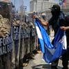 Trump announces drastic move to 'liberate Los Angeles from the migrant invasion' as National Guard arrives