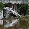 Dozens killed and tens of thousands evacuated as China is hit by 'once in 100 years' flooding