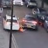 Shocking moment pedestrian is run over by reversing car before being hit AGAIN - as man is arrested over 'attempted murder'