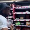 Moment brazen 'thieves' casually walk out of Waitrose with 'handfuls of steak and salmon' - as security guard watches on