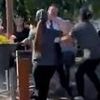 Moment huge brawl erupts outside McDonald's drive-thru with even staff stepping in to trade blows