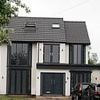 Businessman accused of 'increasing the size of his home in every direction' without permission by council