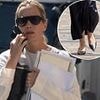 Boss of designer shoe brand Jimmy Choo is banned from driving after being caught driving her £72k Audi without insurance