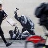 Banksy could finally be unmasked as police launch probe into new artwork on Royal Courts of Justice as potential 'criminal damage' of Grade I listed building