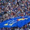 Schools use field logos, higher concession prices and more to pay for the new era in college sports