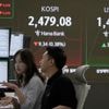 Asian shares trade mixed amid investor worries after Wall Street tumble