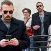 Ben Affleck is glued to his phone as he treats kids Fin and Samuel to lunch after visiting ex Jennifer Garner