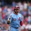 Marchan leads Harper-less Phillies over Braves 5-4 in doubleheader opener for 23rd win in 29 games