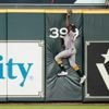 Altuve has 4 hits, 2 home runs, Astros win 11-1 and send A's to 12th loss in 13 games.